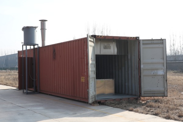 Container-Ein&auml;scherungsmaschine
